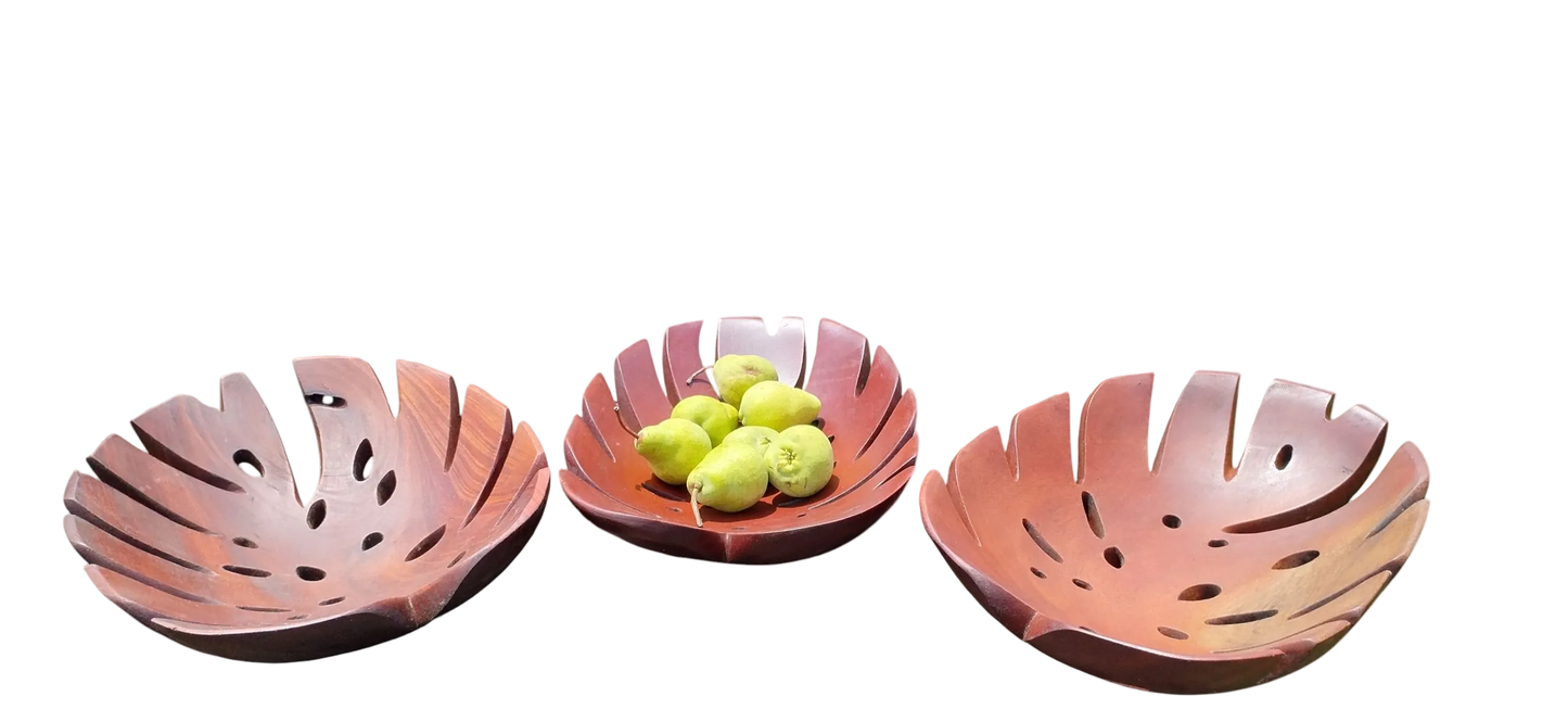 Handcrafted Monstera design wooden bowl made from solid mahogany